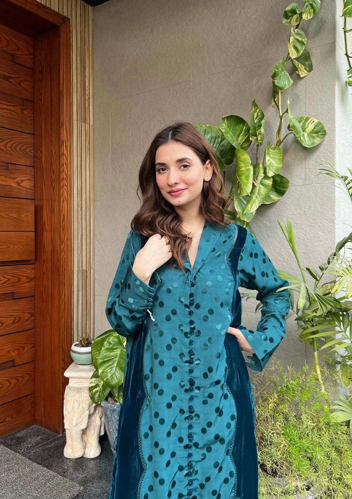 Lara is a teal blue marina shirt contrasted with velvet apple