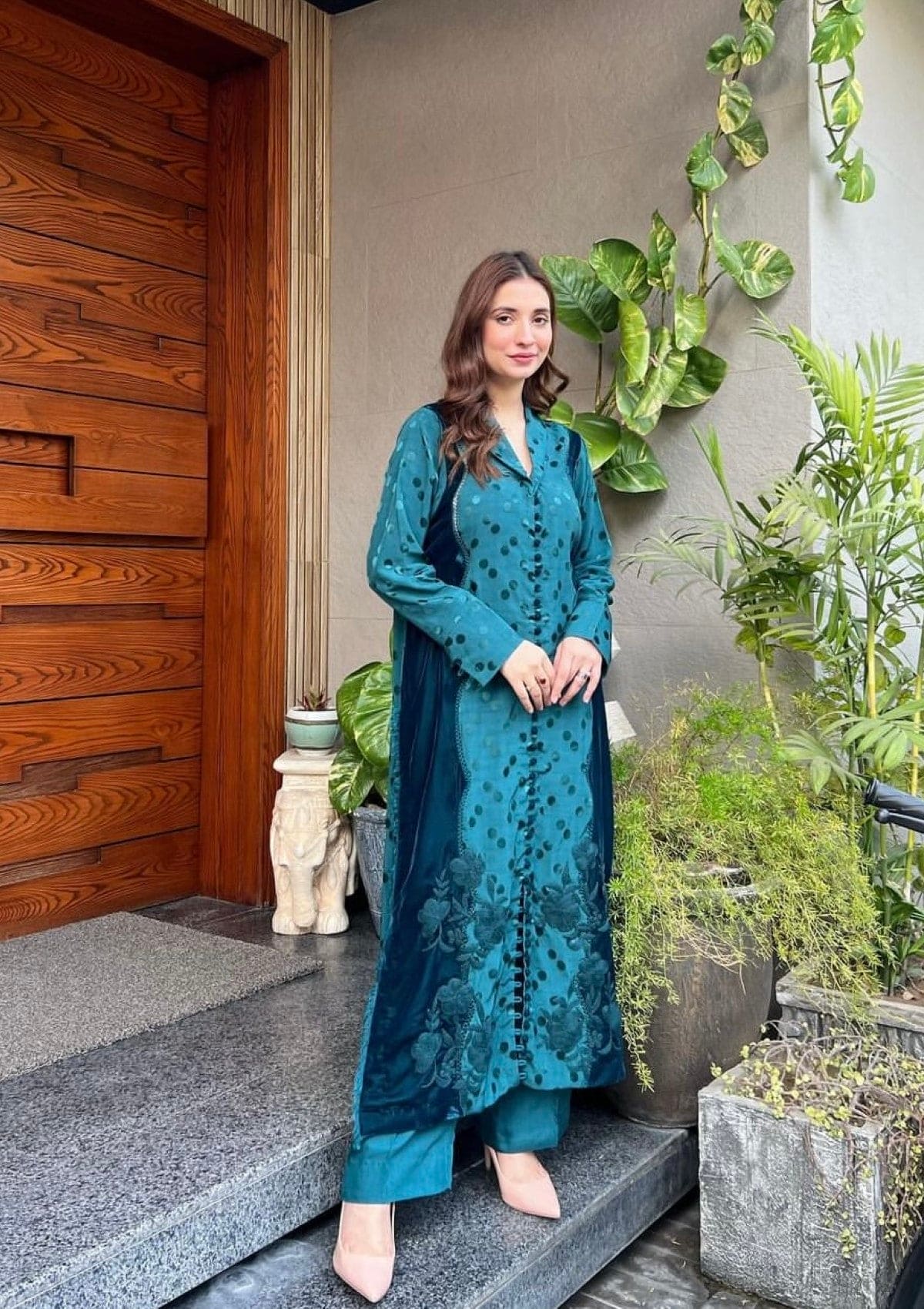 Lara is a teal blue marina shirt contrasted with velvet apple