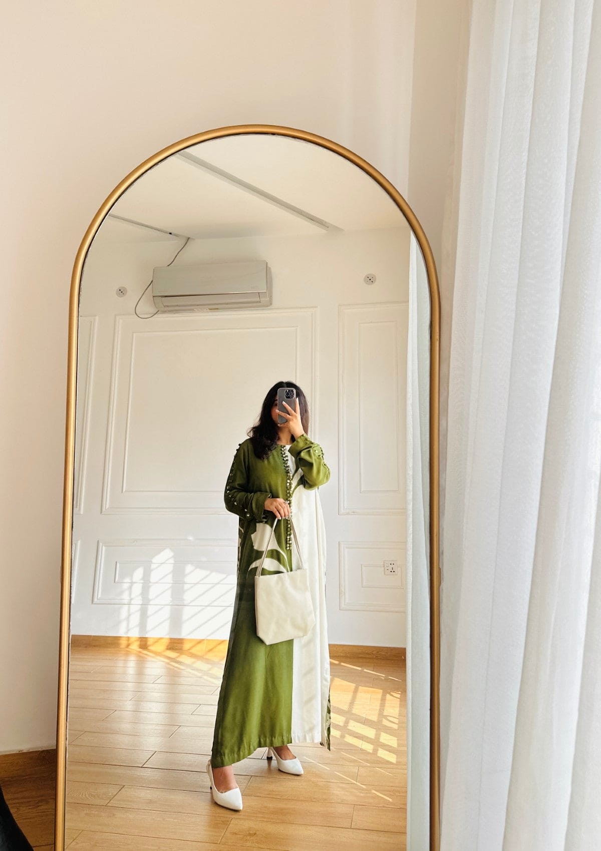Willow is a Two piece apple green marina and white co-ord with printed back and stylised with buttons