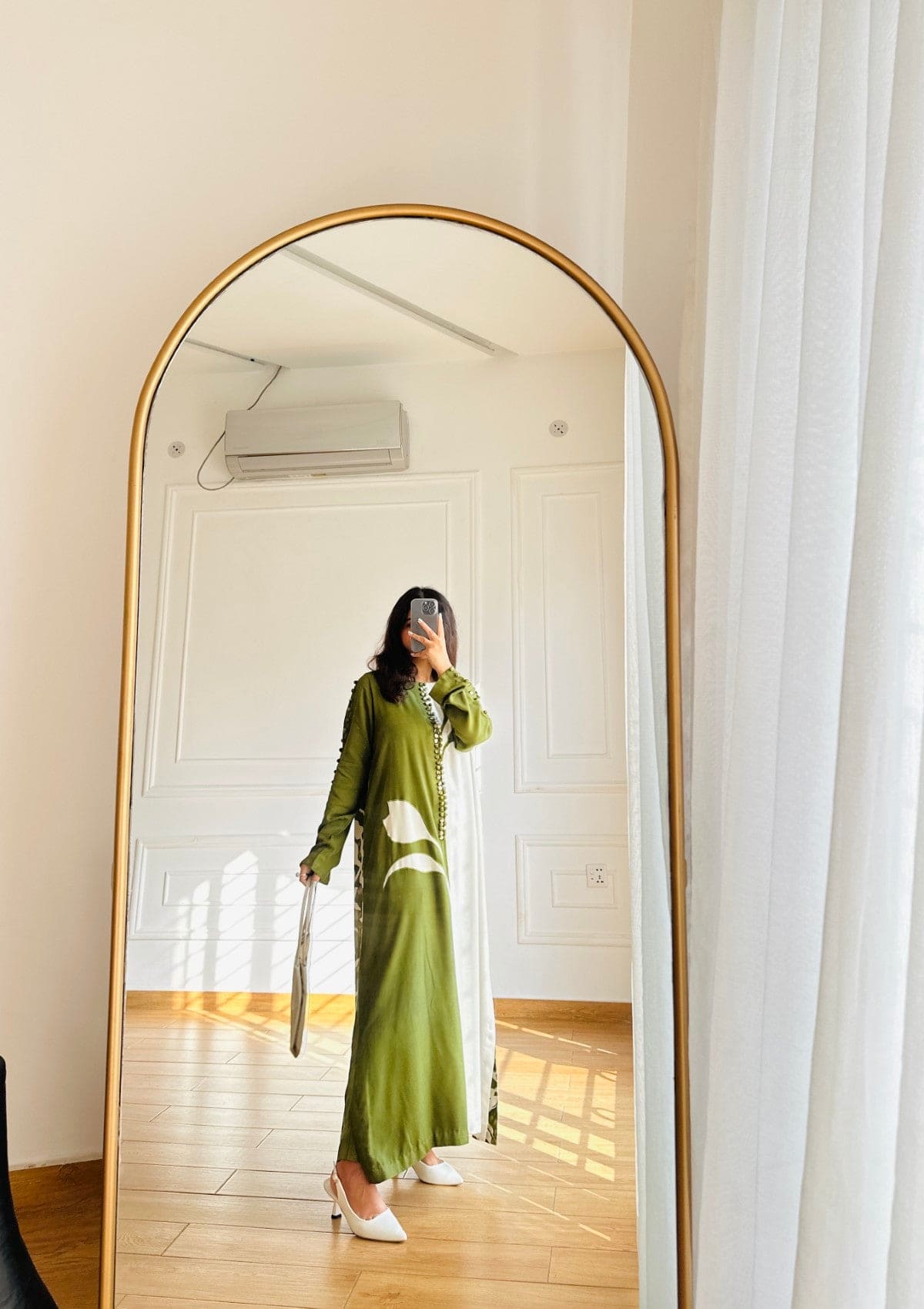 Willow is a Two piece apple green marina and white co-ord with printed back and stylised with buttons
