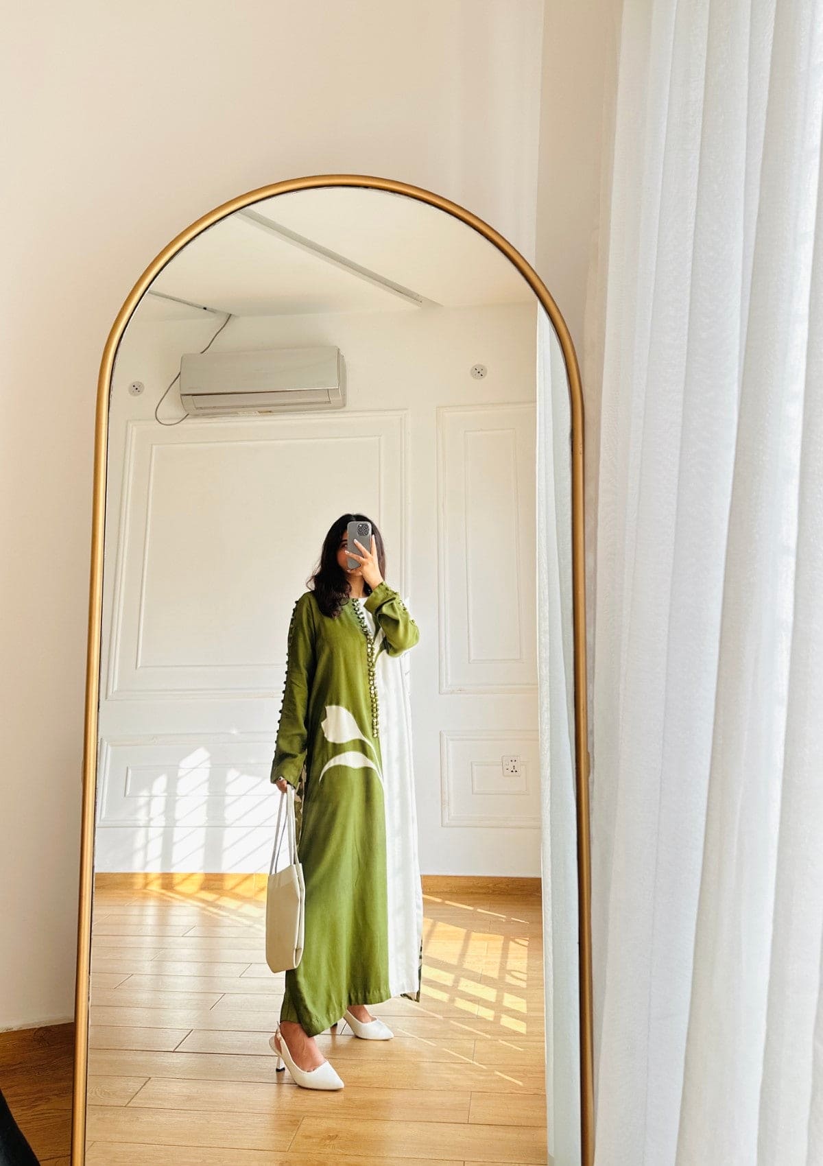 Willow is a Two piece apple green marina and white co-ord with printed back and stylised with buttons