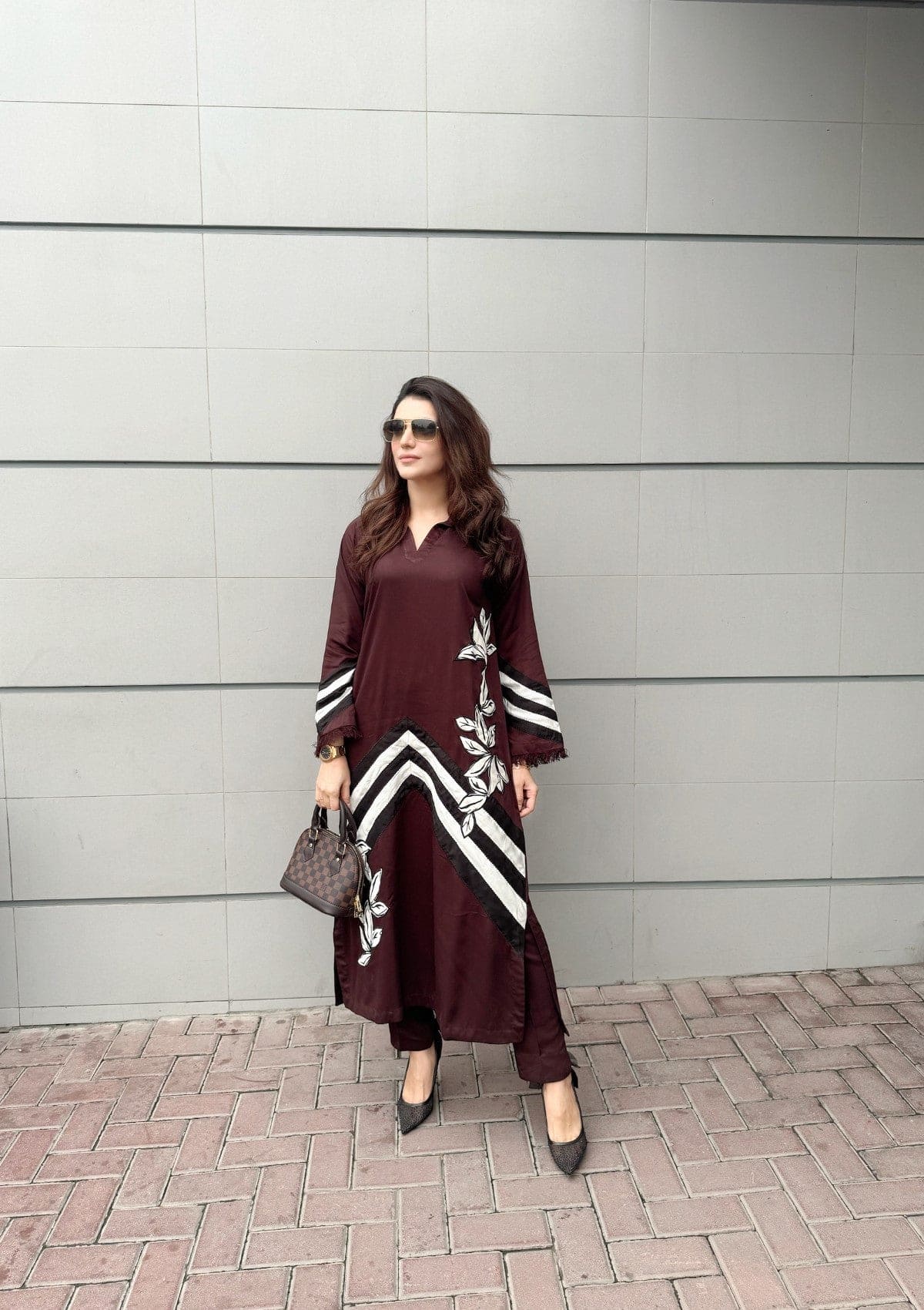 Walnut is a chocolate marina co-ord set with black and white floral appliqué